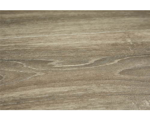 Närbild av en träyta med ådring