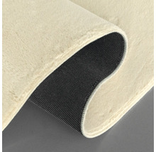 Detalj av en matta med lugg och halkfri undersida