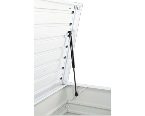 Detaljvy av ett öppet verktygsskåp med gasfjäder