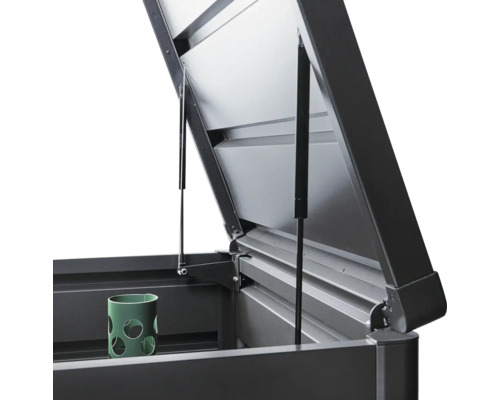 Öppen förvaringslåda med gasfjädrar och behållare