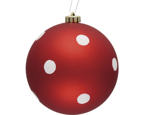Röd julgranskula med vita prickar