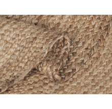 Närbild av en flätad matta av naturfiber.