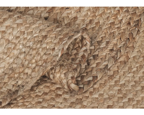 Närbild av en flätad matta av naturfiber.