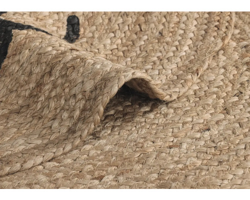 Närbild av en matta gjord av jute med ett mönster