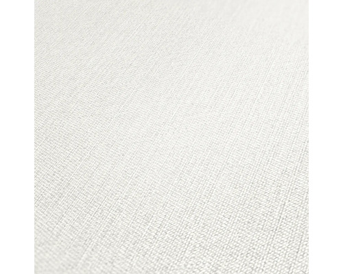 Närbild av en vit fiberdukstapet med en subtil textil struktur