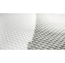 Närbild av ett vitt, vävt tyg med textur