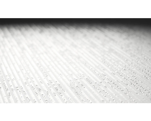 Närbild av en texturerad yta med upphöjda linjer