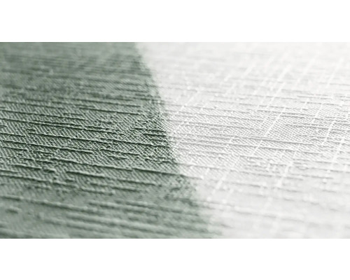 Närbild av ett tyg med vävd struktur