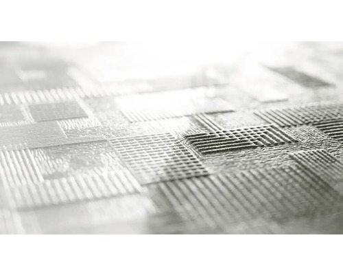 Detaljbild av en strukturerad yta med ett kvadratiskt mönster.