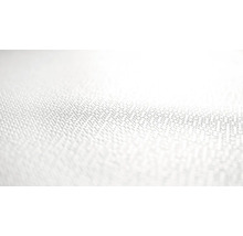 Närbild av en textil yta med fin struktur