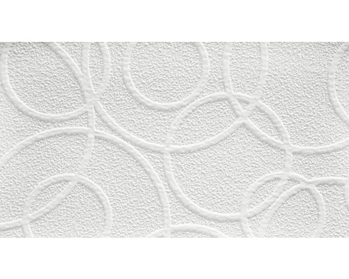 Närbild av en vit strukturtapet med cirkelmönster.