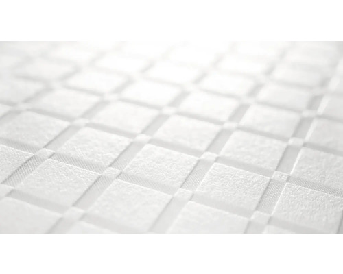 Närbild av en strukturerad, kvadratiskt mönstrad yta