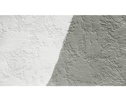 Närbild av en vägg med skrapad gipsstruktur