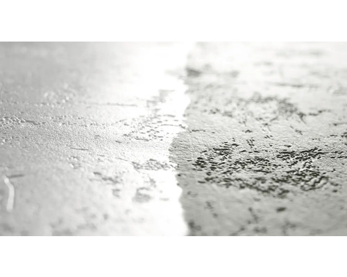 Närbild av en väggstruktur med puts