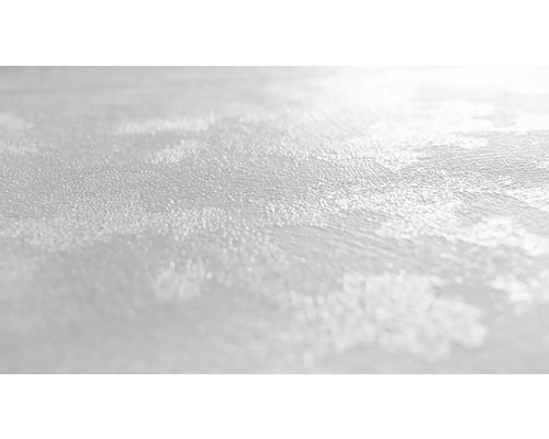 Närbild av en målad vägg med synlig textur.