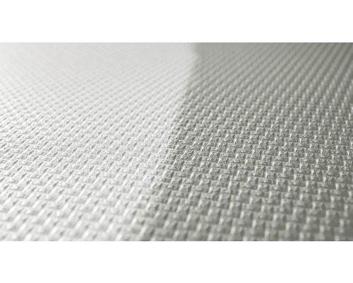 Närbild av en präglad, strukturerad yta.