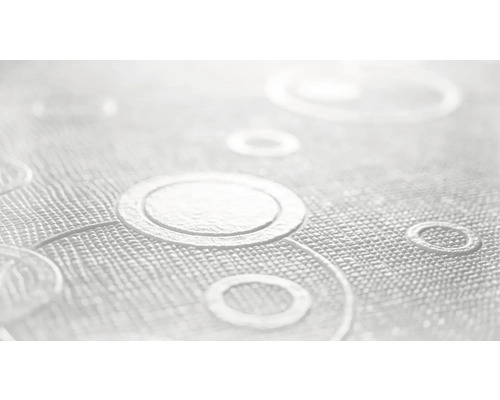 Närbild av en vinyltapet med cirkelmönster