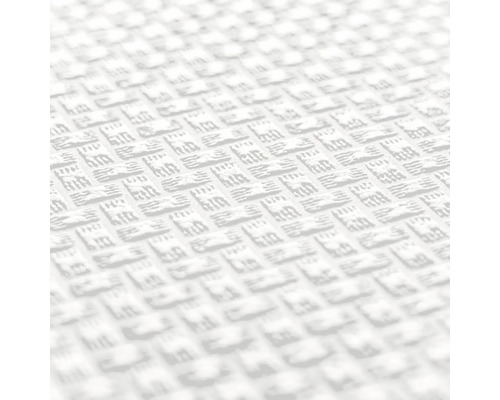 Närbild av ett strukturerat, ljust textilmaterial