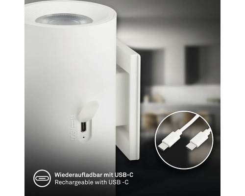 Vit vägglampa med USB-C laddningsport