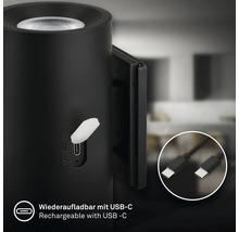 Detalj av en svart lampa med USB-C-laddningsport