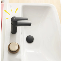 Tvättställ med Grohe-kran, tvål och avloppsplugg