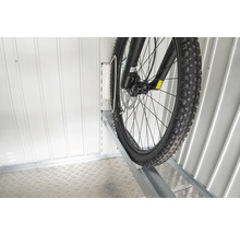 Cykel i cykelställ i cykelrummet