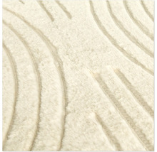 Närbild av en mjuk matta med randigt mönster