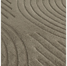 Närbild av en matta med vågigt mönster