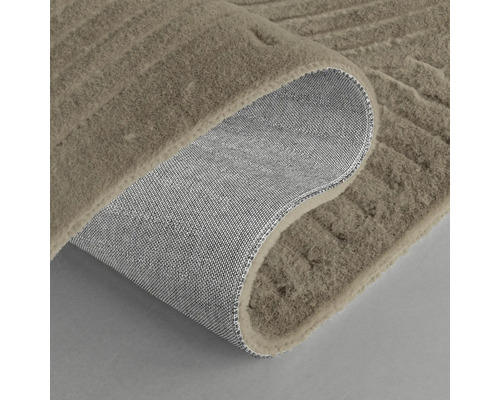 Matta med reliefmönster och textilbaksida