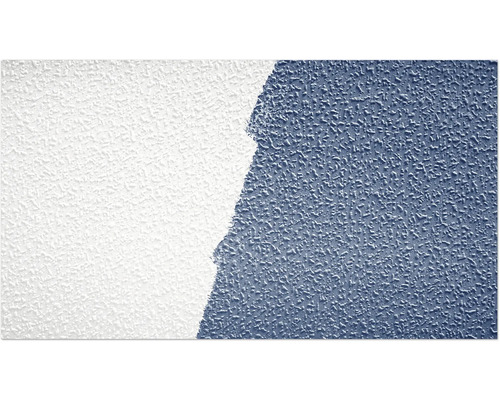 Närbild av en vägg med putsstruktur, delvis målad