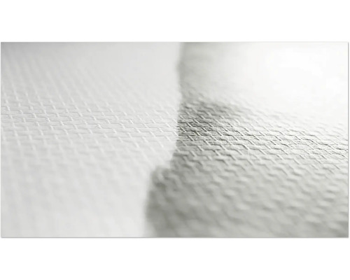 Detaljvy av en vit textiltapet med struktur