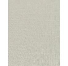 Detaljvy av en beige strukturtapet.