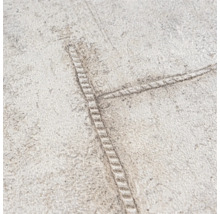 Närbild av en vinyltapet med strukturerat mönster