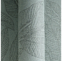 Närbild av en strukturerad tapet med bladmönster