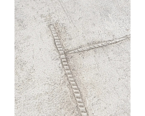 Detaljvy av en tapet med jeanssömmar