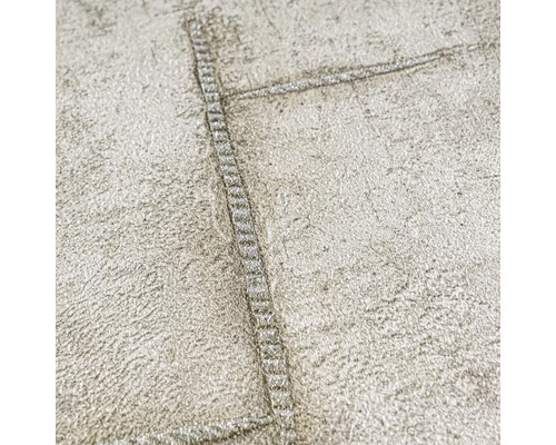 Närbild av en strukturtapet med sömmönster