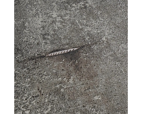 Närbild av en grå yta med en repa