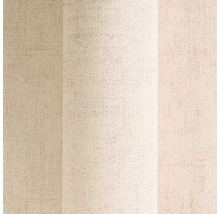 Närbild av en beige strukturtapet.