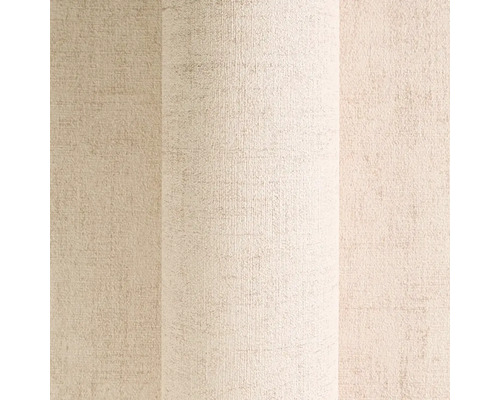 Närbild av en beige strukturtapet.