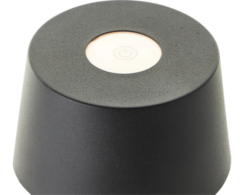 Svart bordslampa med strömbrytare