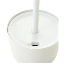 Detalj av en vit golvlampa