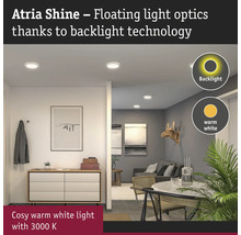 Vardagsrum med Atria Shine taklampor med bakgrundsbelysning för indirekt belysning