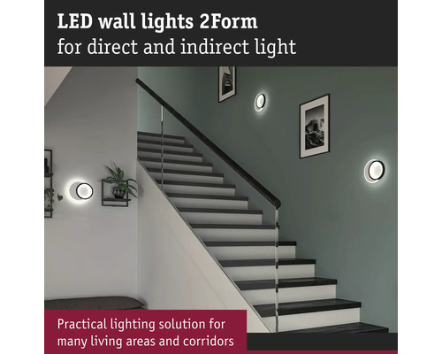 Trapphus med LED-vägglampor för direkt och indirekt belysning
