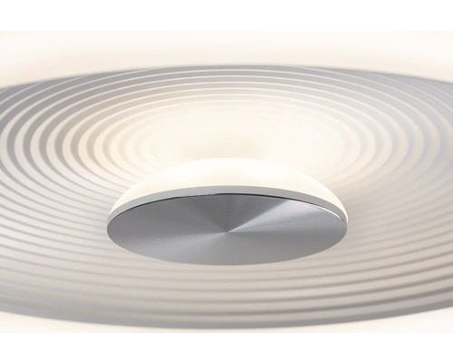 Närbild av en taklampa med cirkelformat mönster