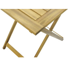 Detaljvy av ett hopfällbart träbord