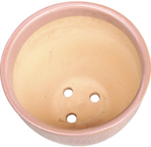 Terrakottakruka med dräneringshål