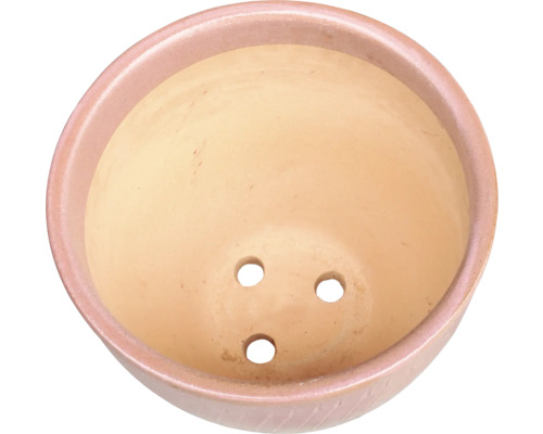 Terrakottakruka med dräneringshål