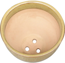 Keramisk blomkruka med tre hål för dränering