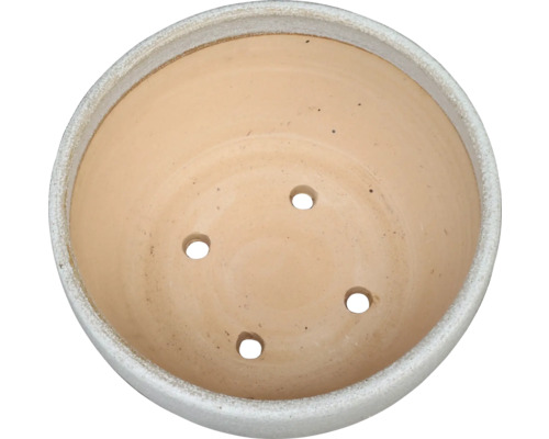 Blomkruka med dräneringshål