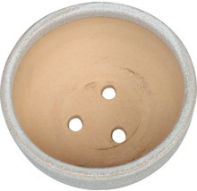 Terrakottakruka med dräneringshål